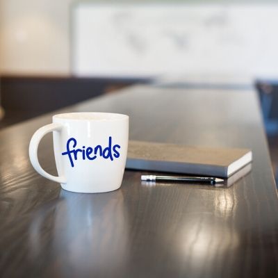 Friends Coffee Mug on Table