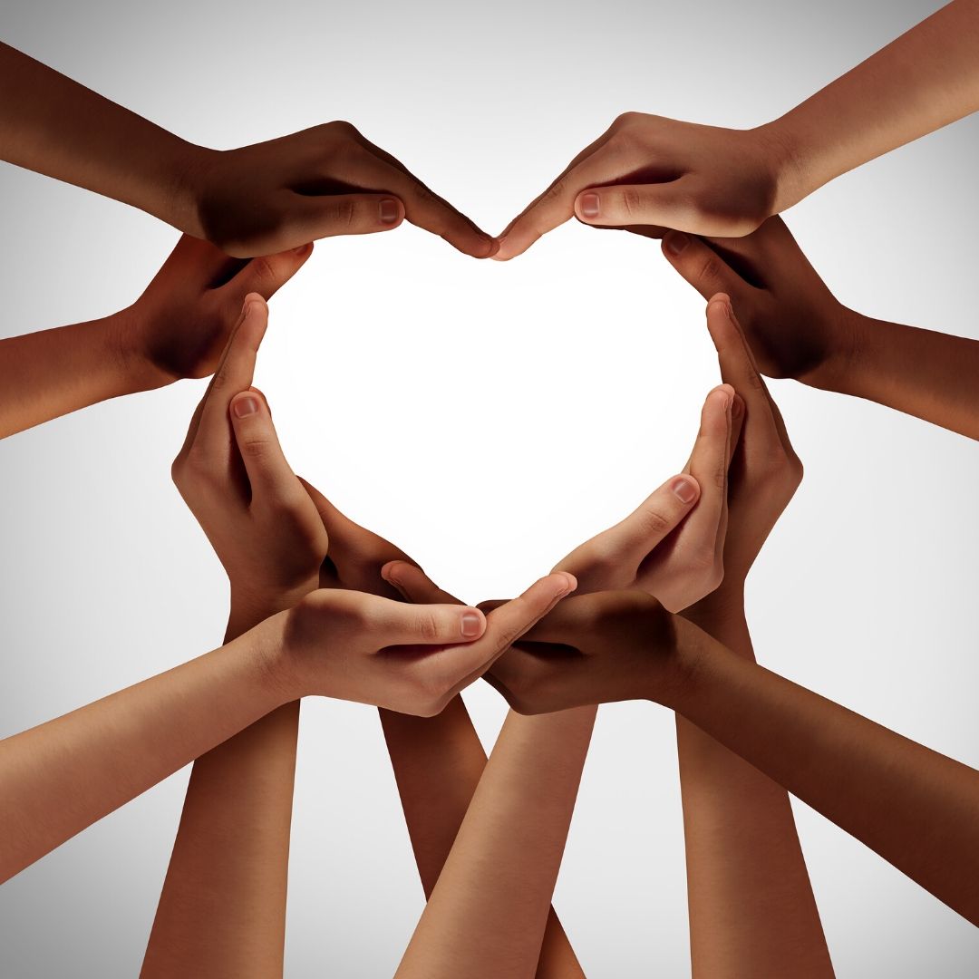 Standing-Together-During-Tragedy-diversity-hands-creating-heart-shape